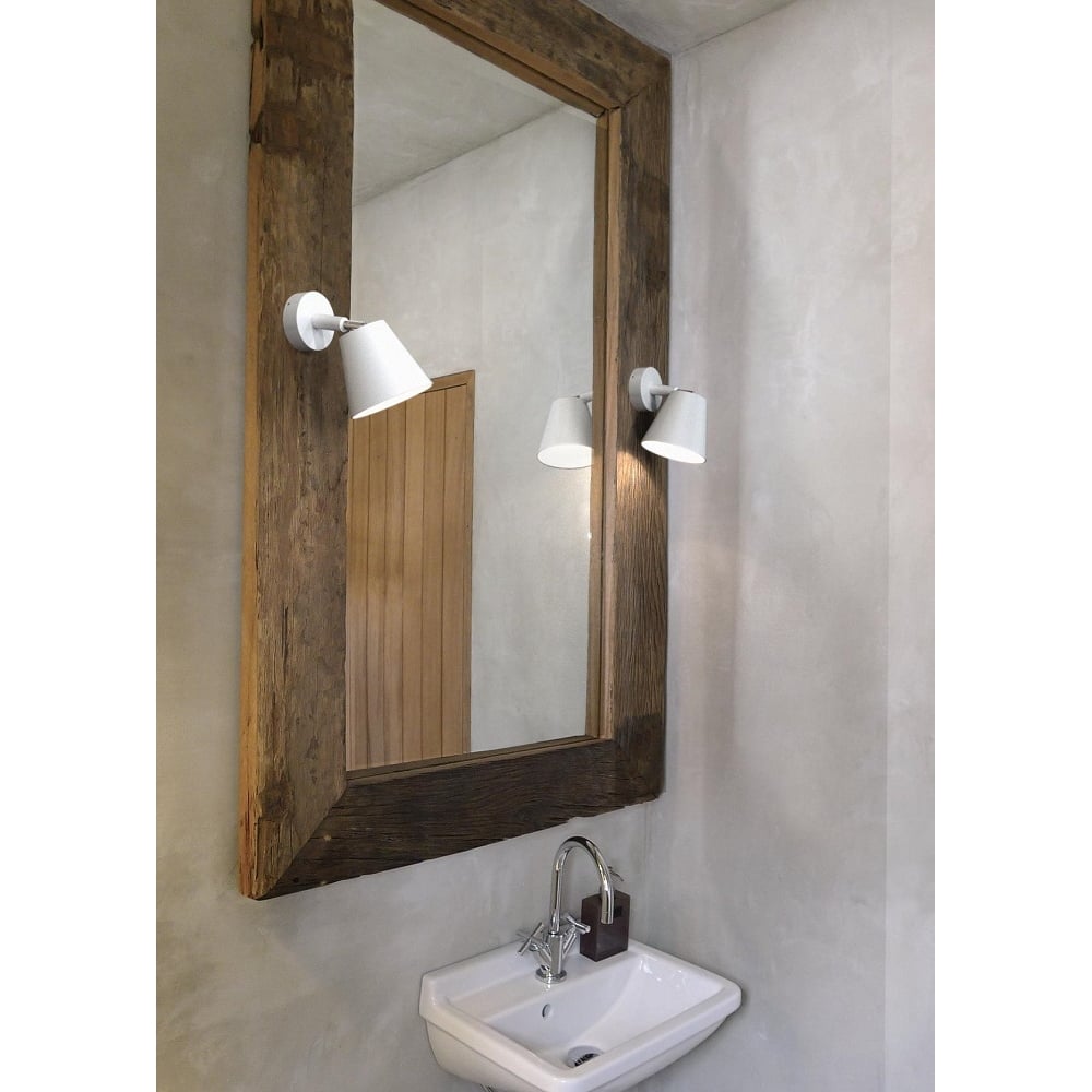 LED white bathroom wall light fitted to either side of a mirror