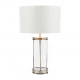 Small antique brass and glass base table lamp with white shade with metiallic inner liner.